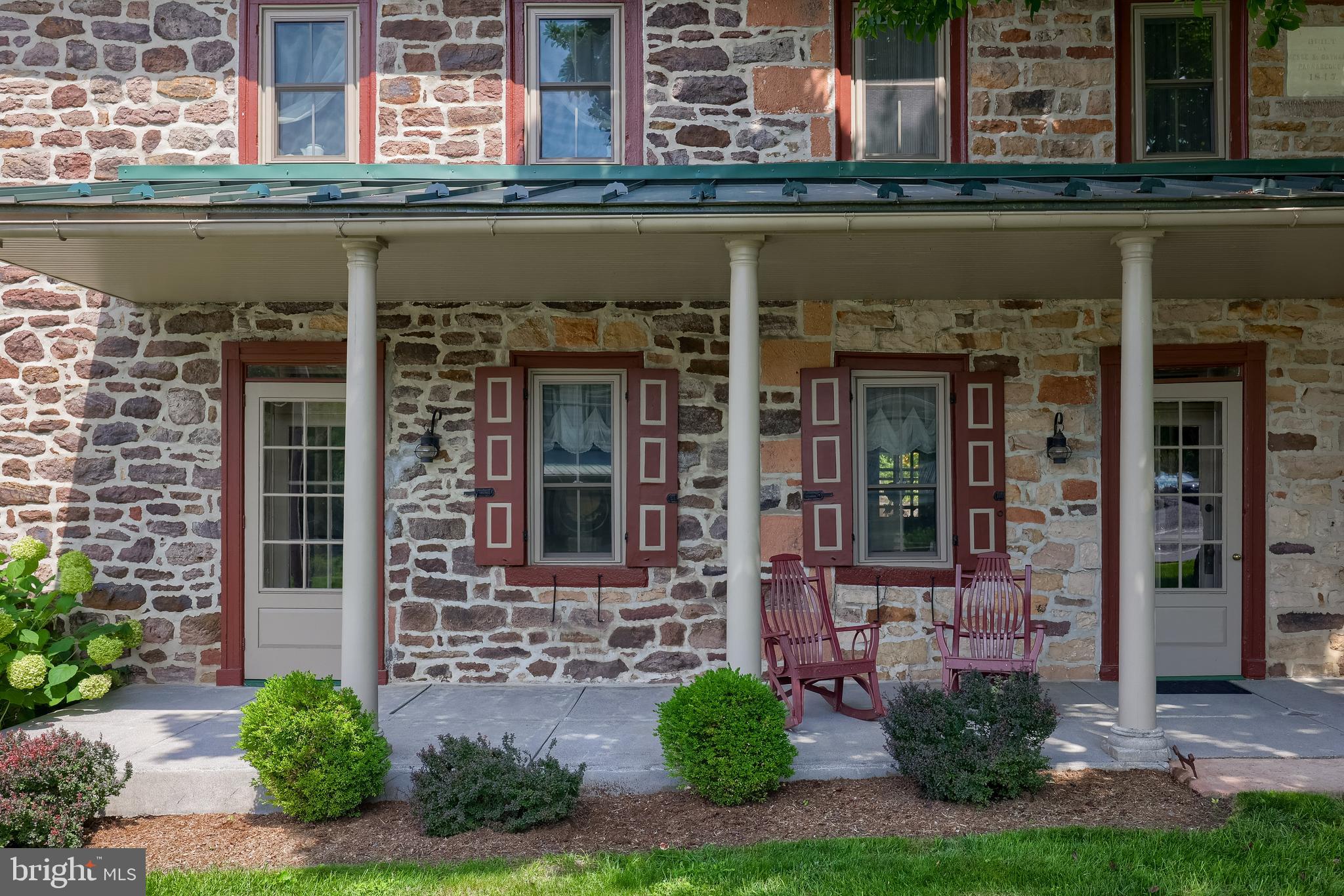 335 North Clay Road Lititz, PA 17543 - Photo 6 of 150 front view of a brick house with a small yard