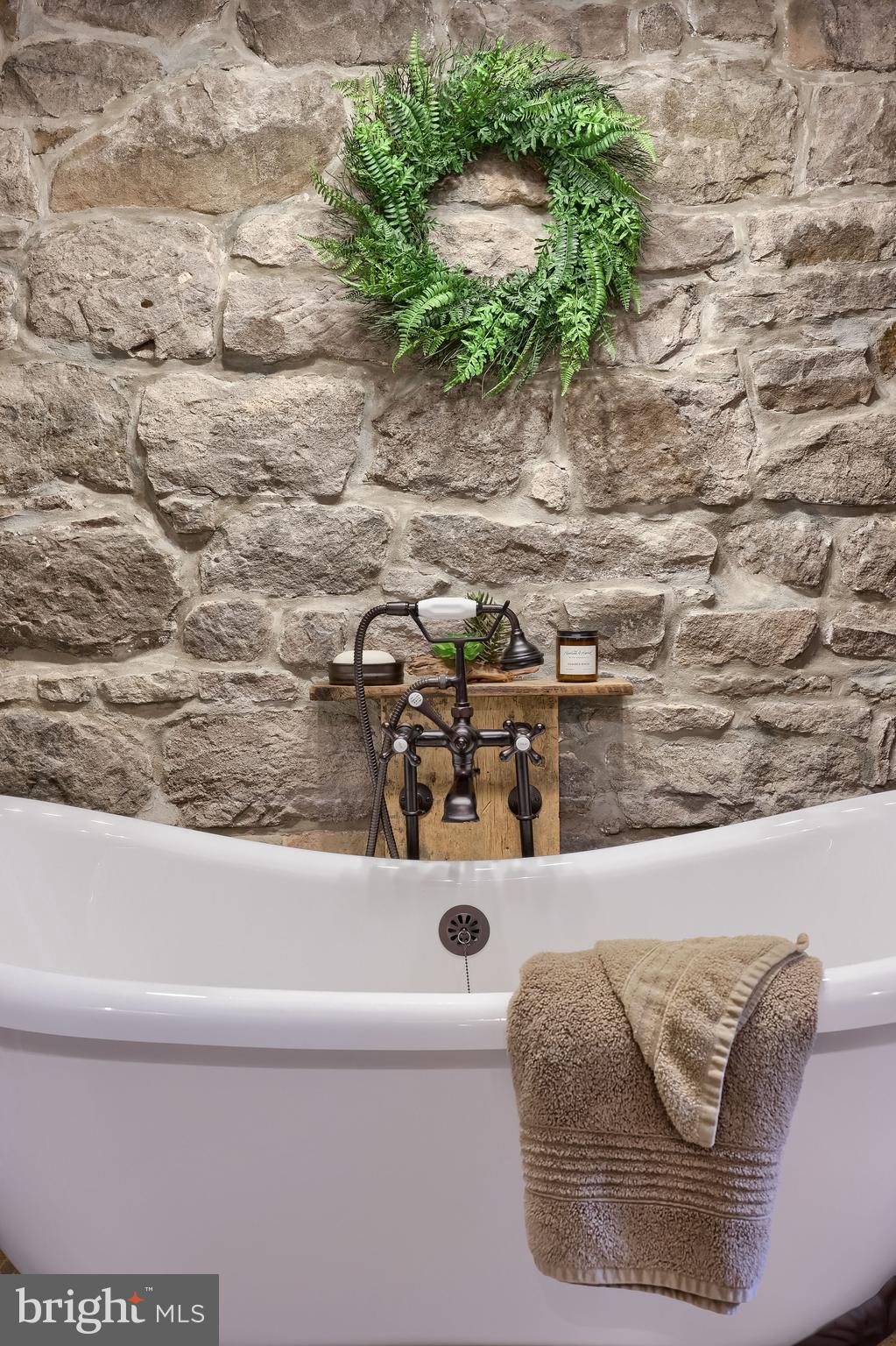 335 North Clay Road Lititz, PA 17543 - Photo 79 of 150 a bath tub sitting in a blue and white bath tub