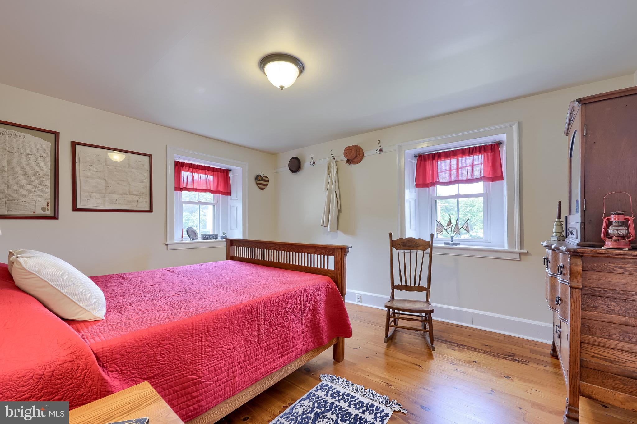 335 North Clay Road Lititz, PA 17543 - Photo 86 of 150 a bedroom with a bed and wooden floor