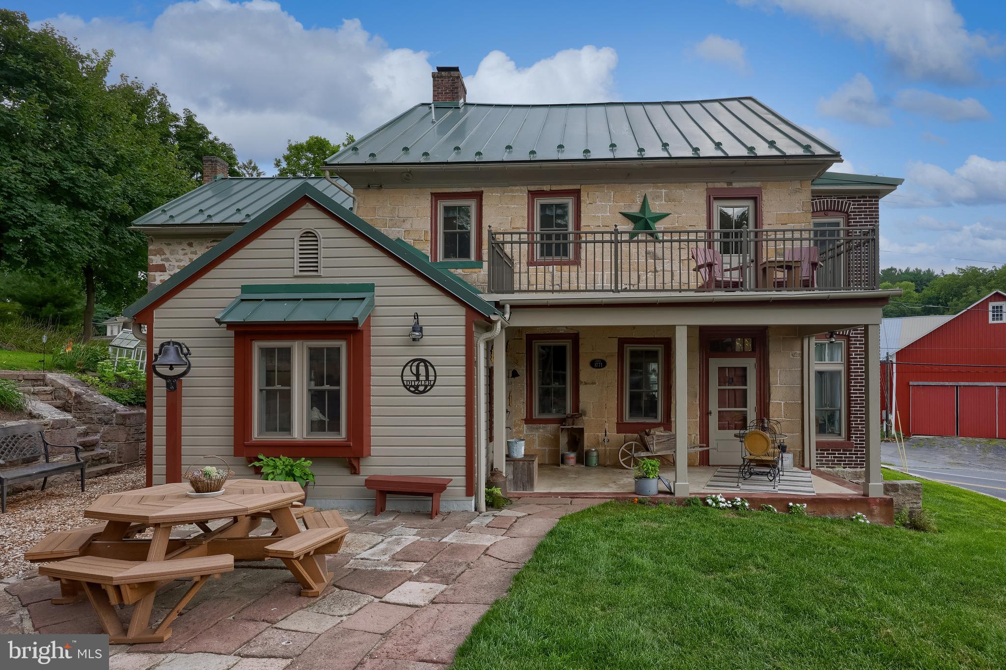 335 North Clay Road Lititz, PA 17543 - Photo 9 of 150 a view of a house with a yard potted plants and a table