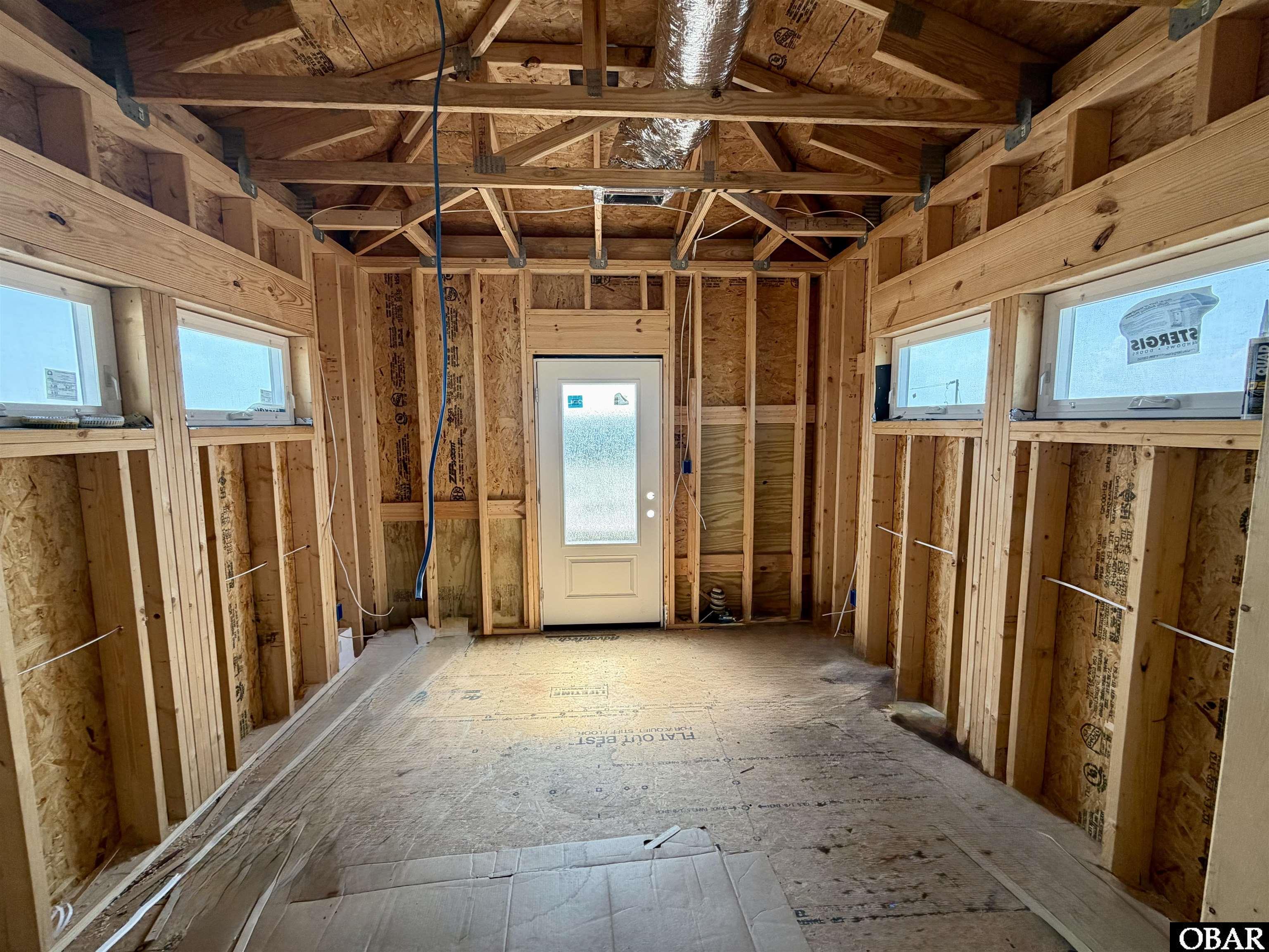 1590 Sandfiddler Road Corolla, NC 27927 - Photo 17 of 39 3rd floor W facing bedroom