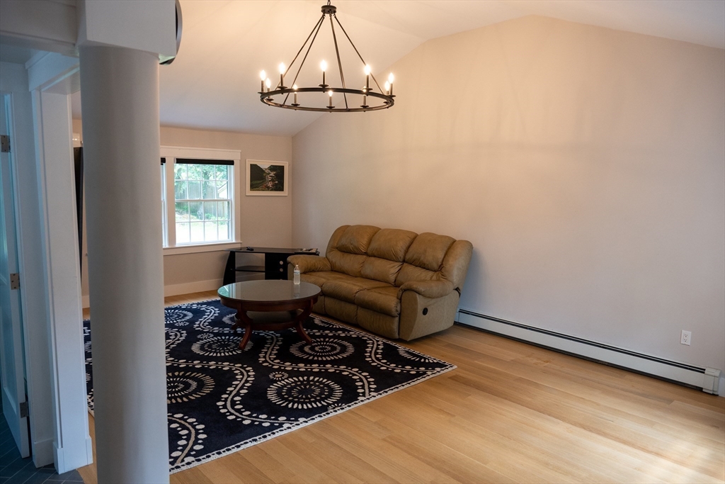 20 Hemlock Drive Canton, MA 02021 - Photo 4 of 14 a living room with furniture and a window