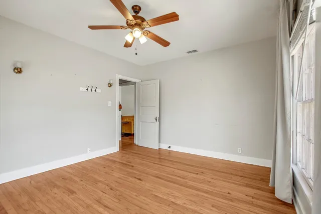 a kitchen with stainless steel appliances granite countertop a stove refrigerator sink and cabinets
