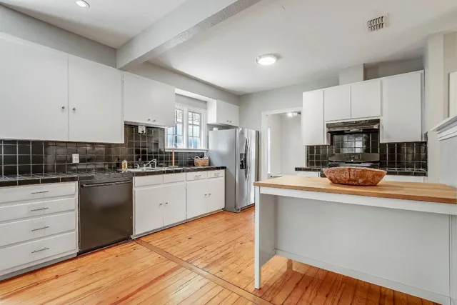 a bathroom with a sink and toilet