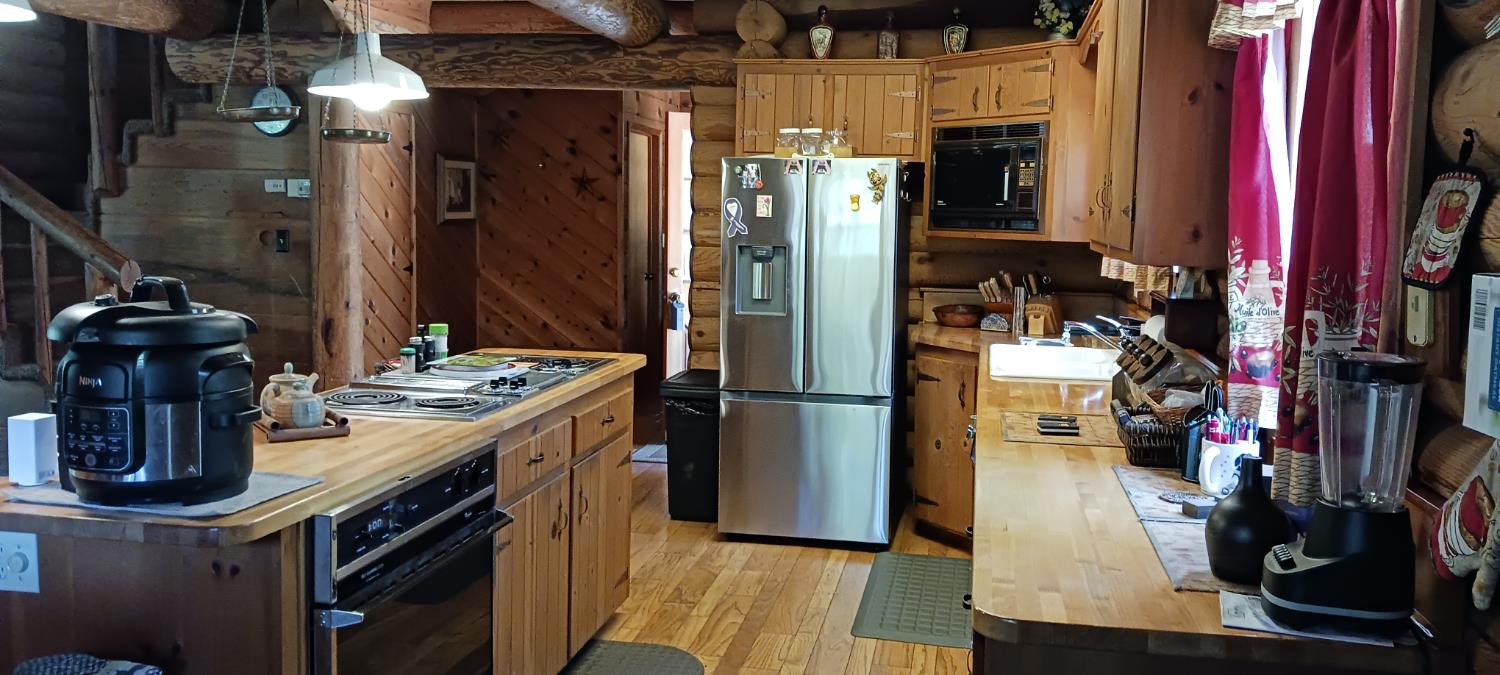 1550 Copperton Road Camino, CA 95709 - Photo 19 of 22 a kitchen with refrigerator and washer