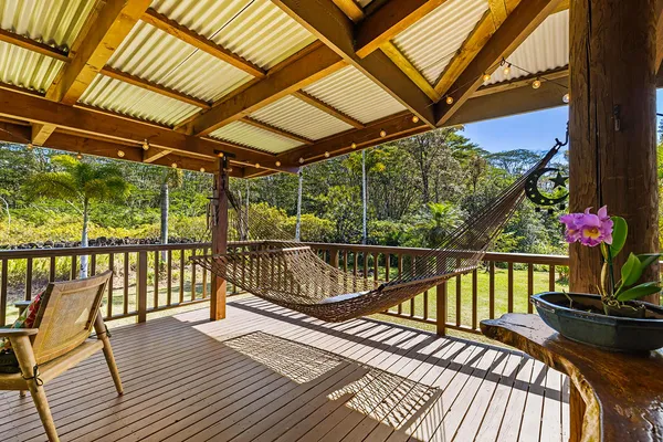 a view of balcony with wooden floor