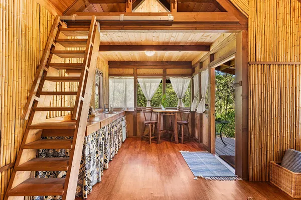 a bedroom with furniture and a window