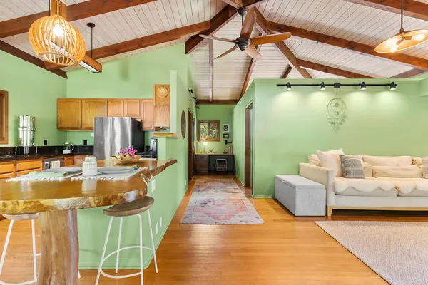 a view of a swimming pool and a patio