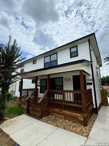 a front view of a house with a balcony