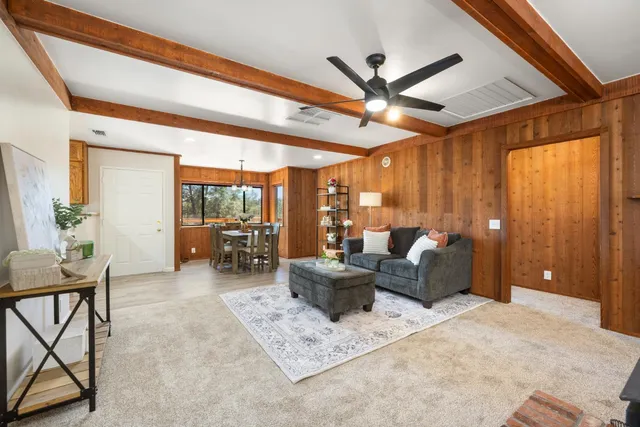 a bathroom with a sink a mirror and a shower
