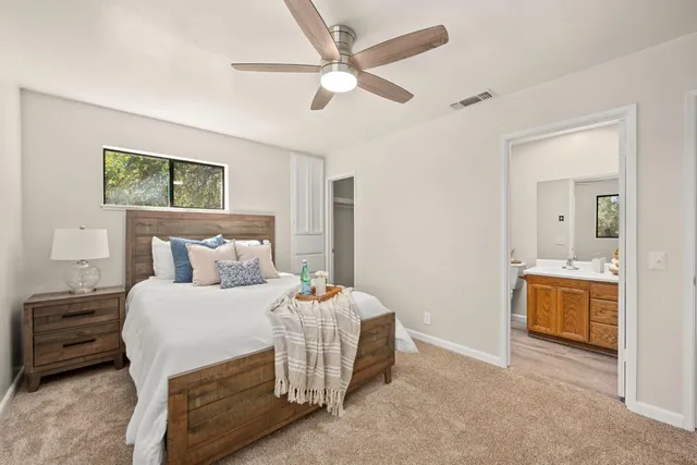 a view of balcony with wooden floor and fence