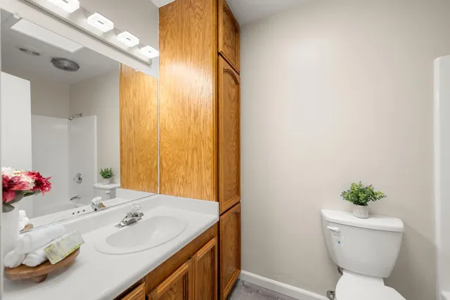 a view of a yard with large trees