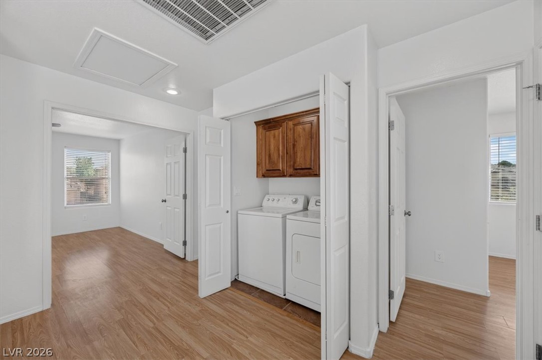 552 Albacate Street Henderson, NV 89015 - Photo 20 of 40 Functional utility space with convenient washer and dryer.