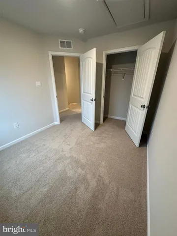 a view of an empty room and a gallery