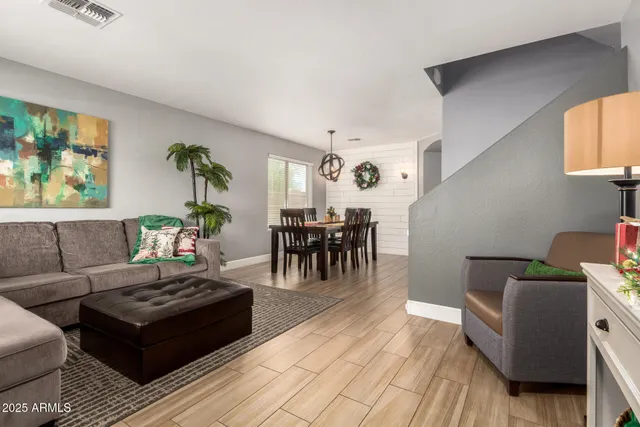 a kitchen with stainless steel appliances a refrigerator stove and microwave