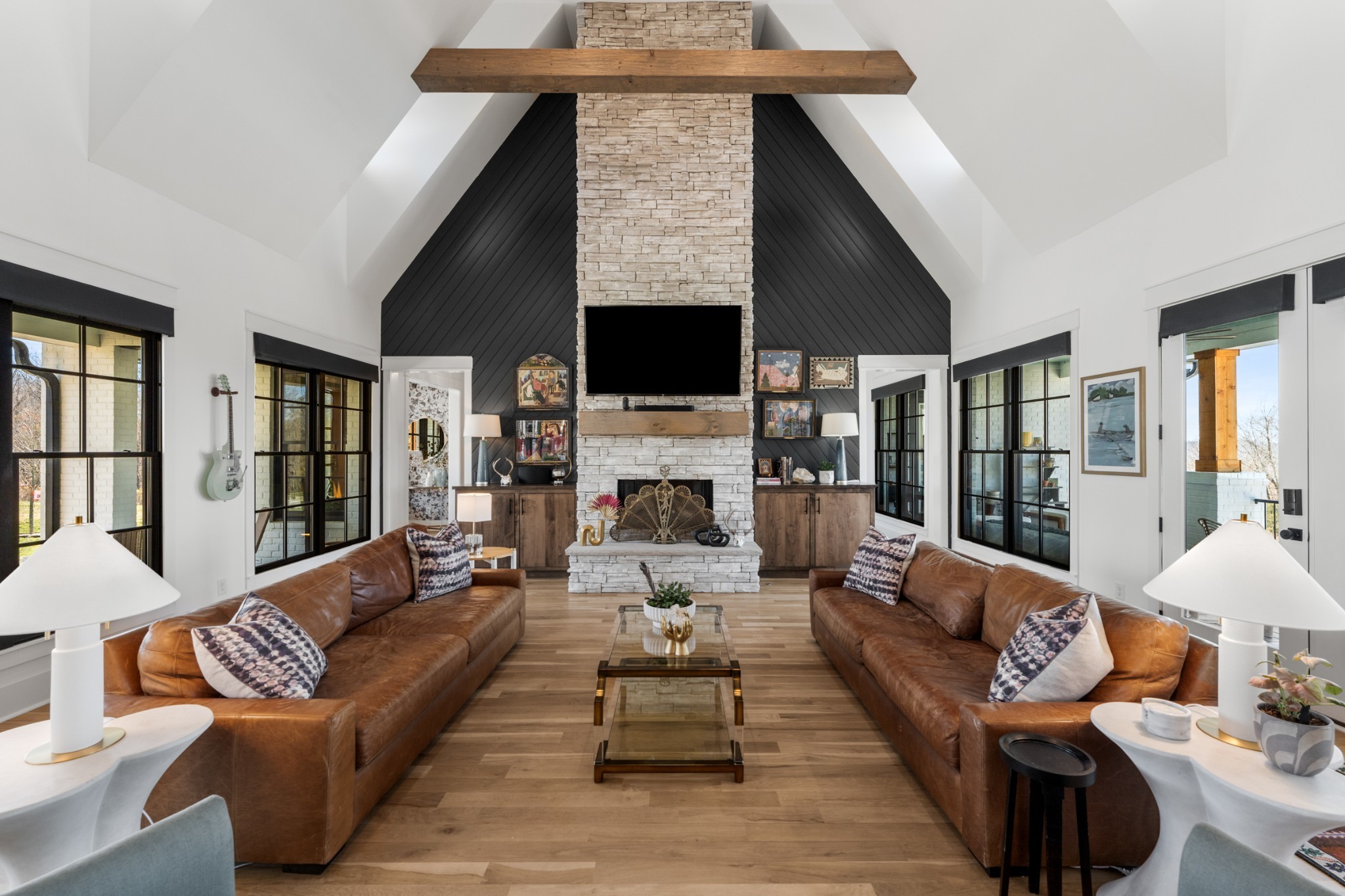 1770 Lockertsville Road Ashland City, TN 37015 - Photo 14 of 95 a living room with furniture a fireplace and a flat screen tv