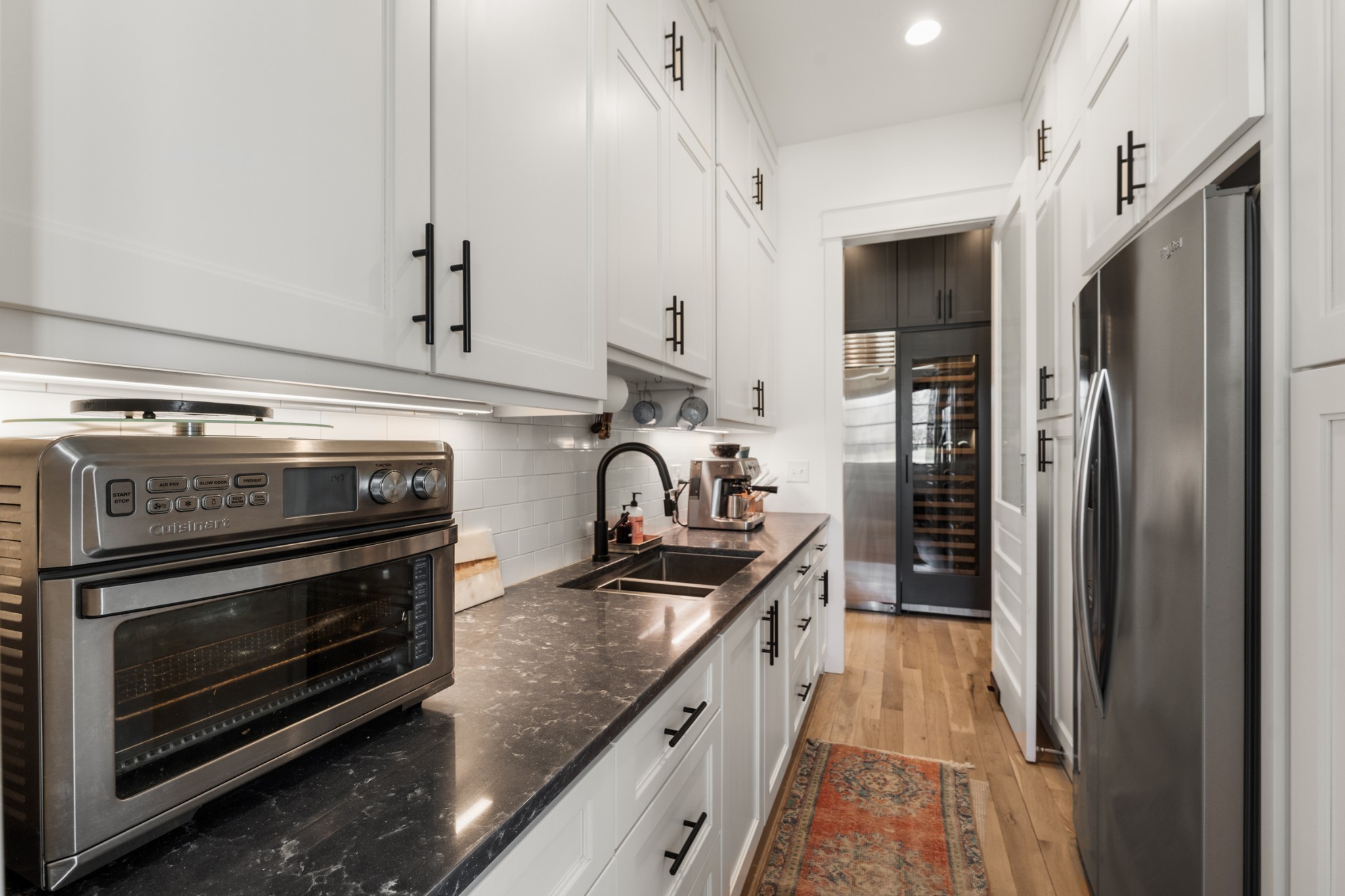 1770 Lockertsville Road Ashland City, TN 37015 - Photo 27 of 95 a kitchen with stainless steel appliances granite countertop a stove and a refrigerator