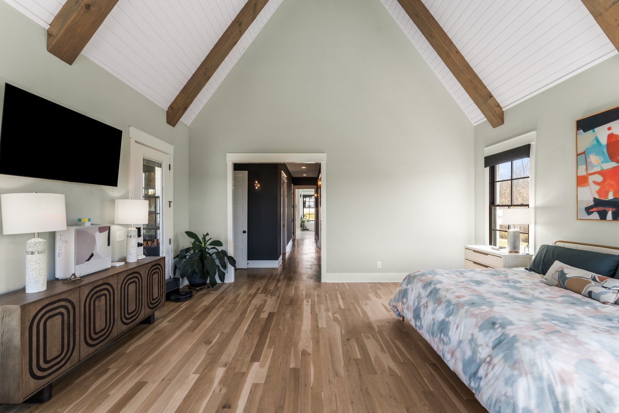 1770 Lockertsville Road Ashland City, TN 37015 - Photo 44 of 95 a spacious bedroom with a bed and flat screen tv