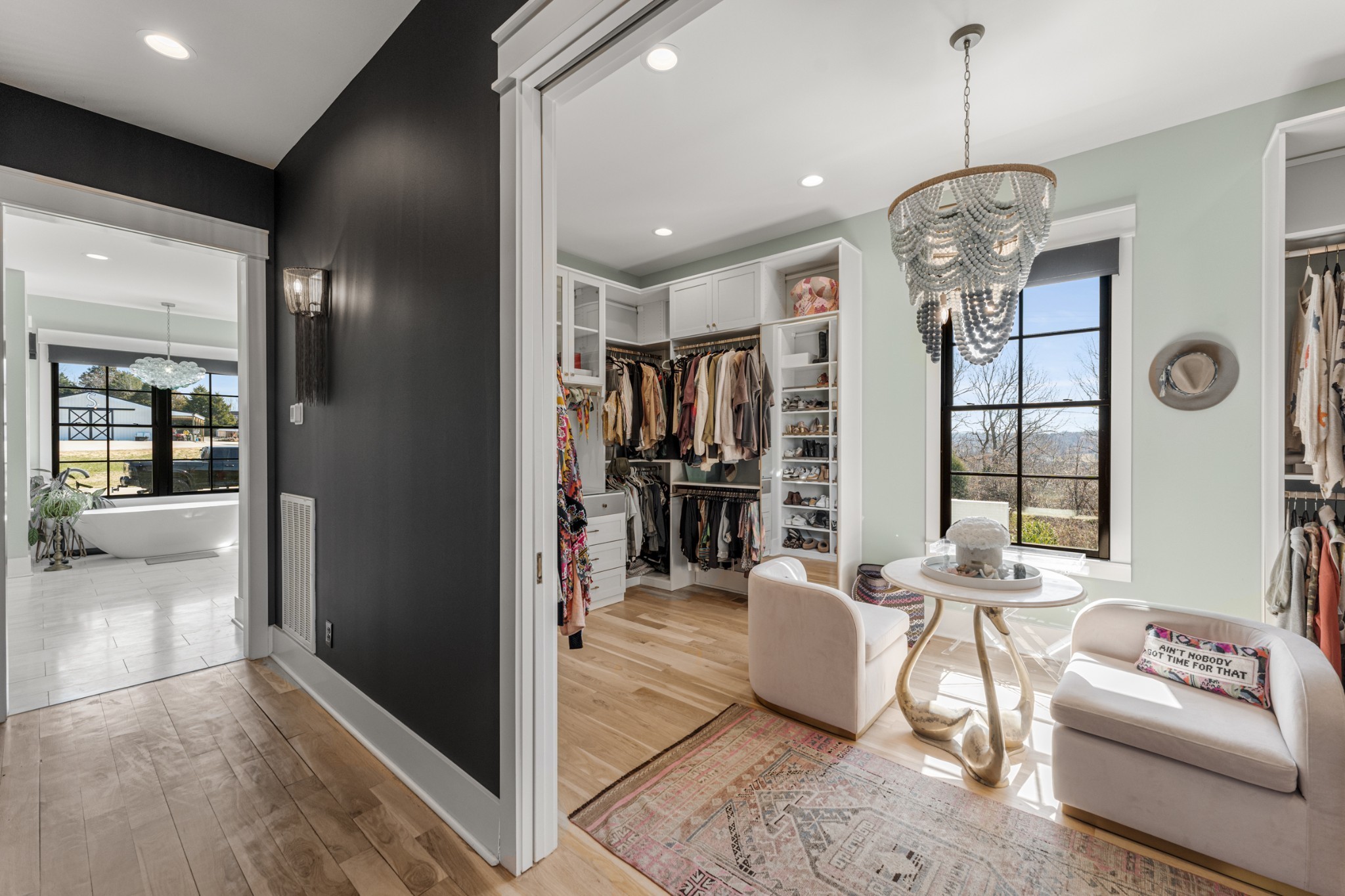 1770 Lockertsville Road Ashland City, TN 37015 - Photo 45 of 95 a view of a dining room and livingroom with furniture wooden floor a chandelier