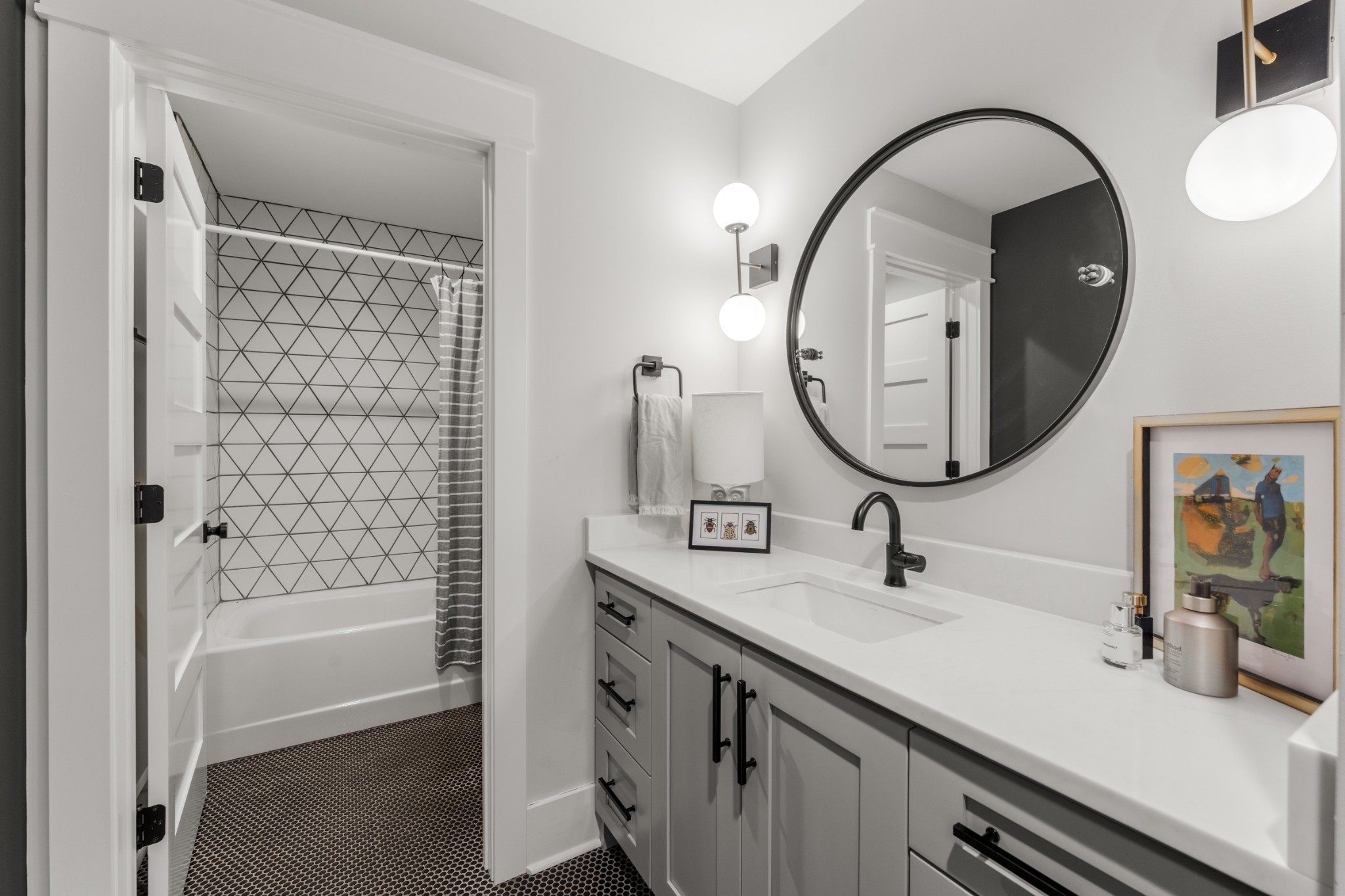 1770 Lockertsville Road Ashland City, TN 37015 - Photo 50 of 95 a bathroom with a tub sink and mirror