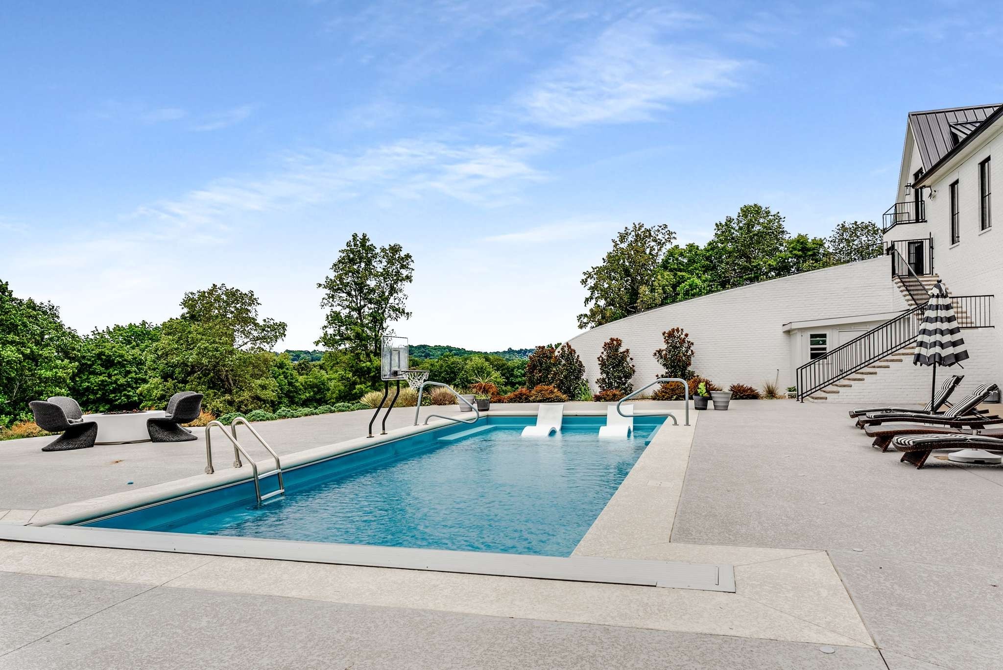1770 Lockertsville Road Ashland City, TN 37015 - Photo 60 of 95 a view of a swimming pool with a patio and a garden
