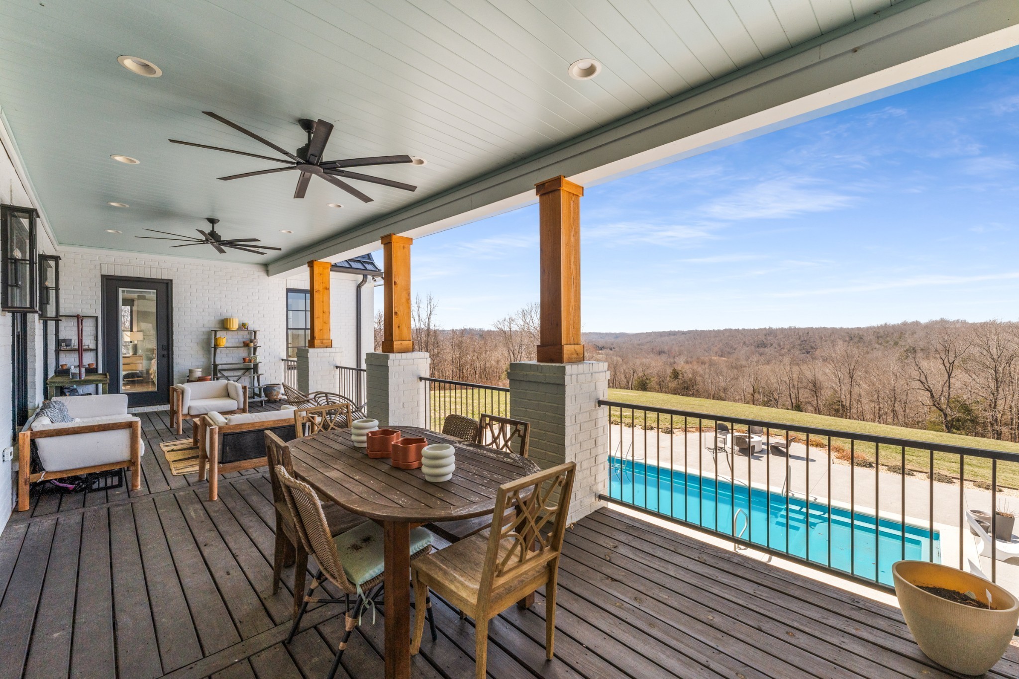 1770 Lockertsville Road Ashland City, TN 37015 - Photo 67 of 95 a view of a patio with wooden floor table and chairs