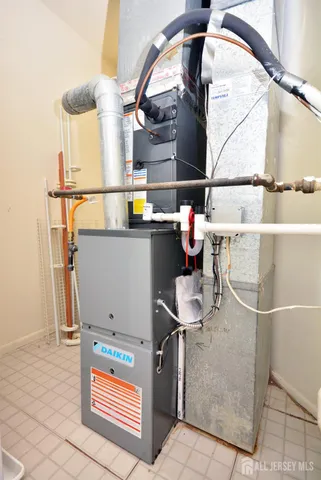 a room with table and chairs