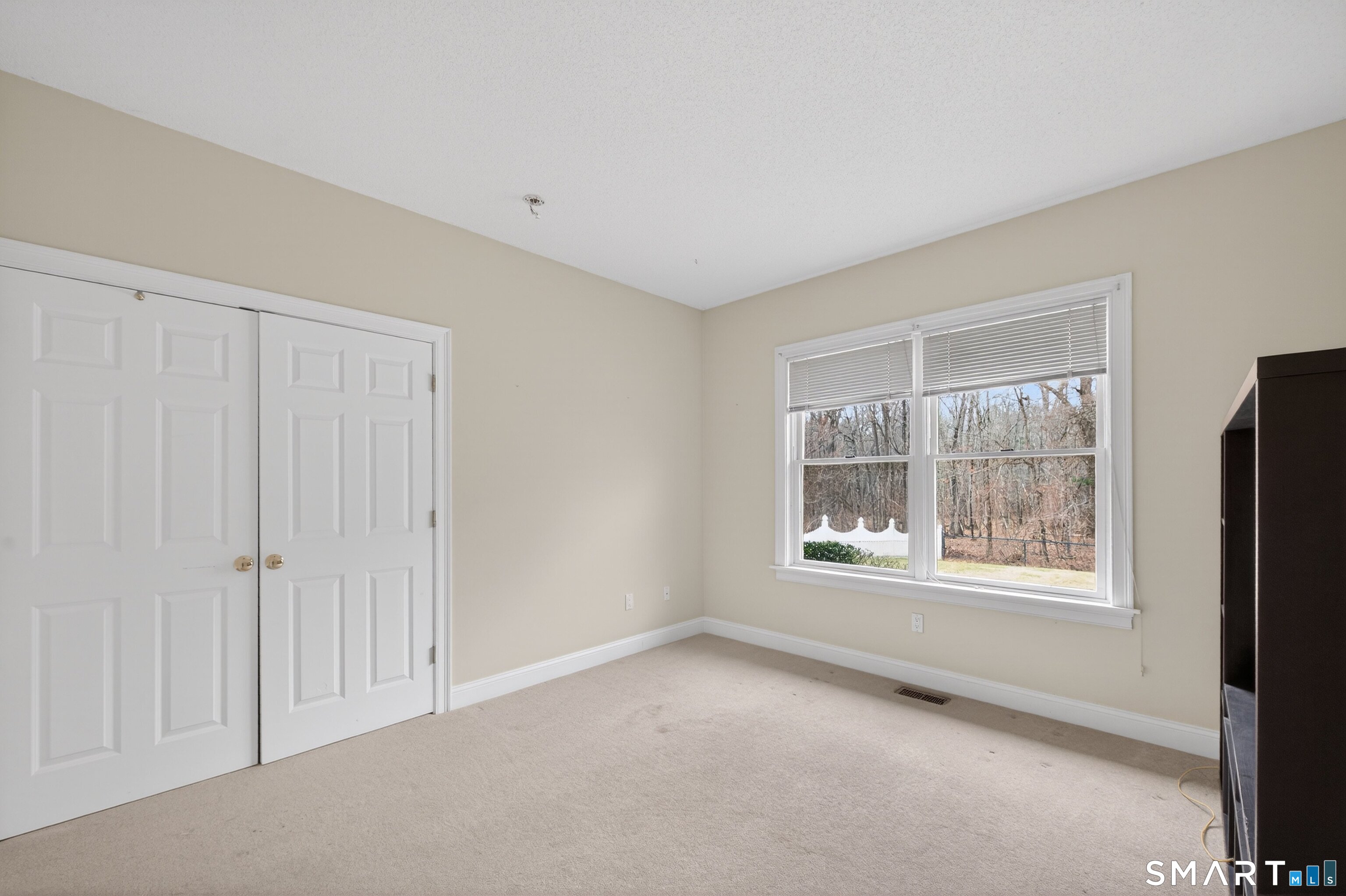 724 Strong Road South Windsor, CT 06074 - Photo 10 of 39 a view of an empty room with a window