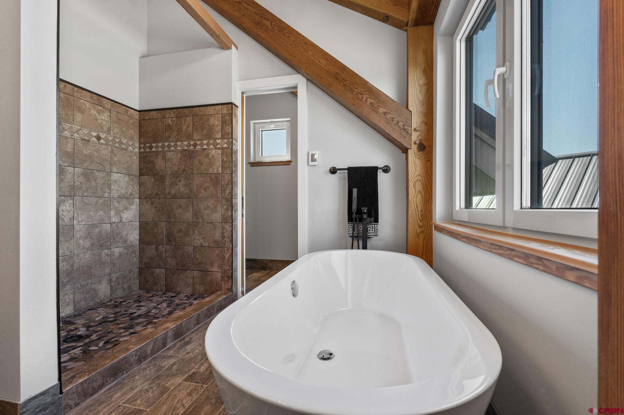 34958 Rd P.2 Mancos, CO 81328 - Photo 32 of 44 a bathroom with a sink and shower