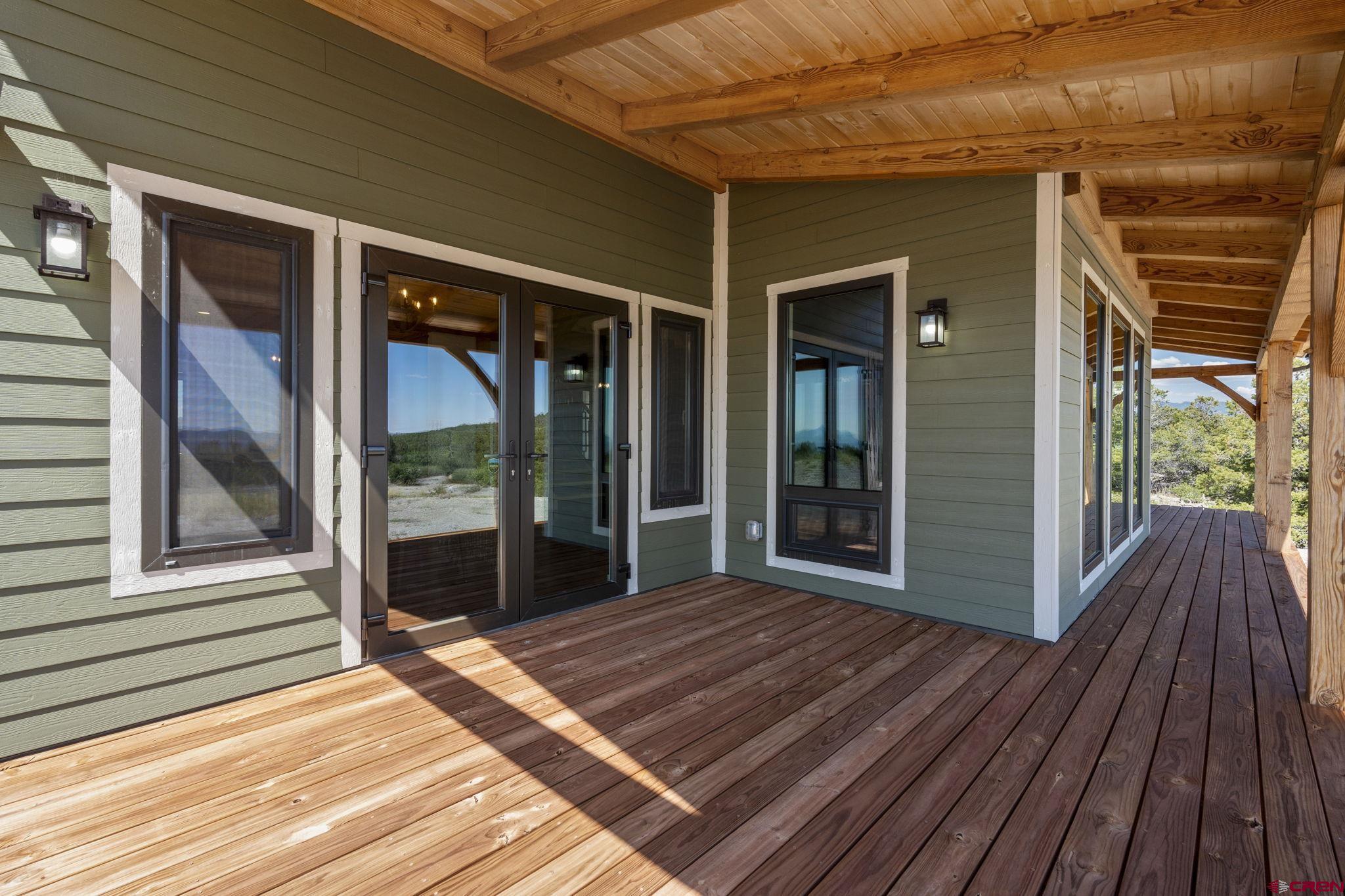 34958 Rd P.2 Mancos, CO 81328 - Photo 35 of 44 a view of a room with wooden floor and iron stairs