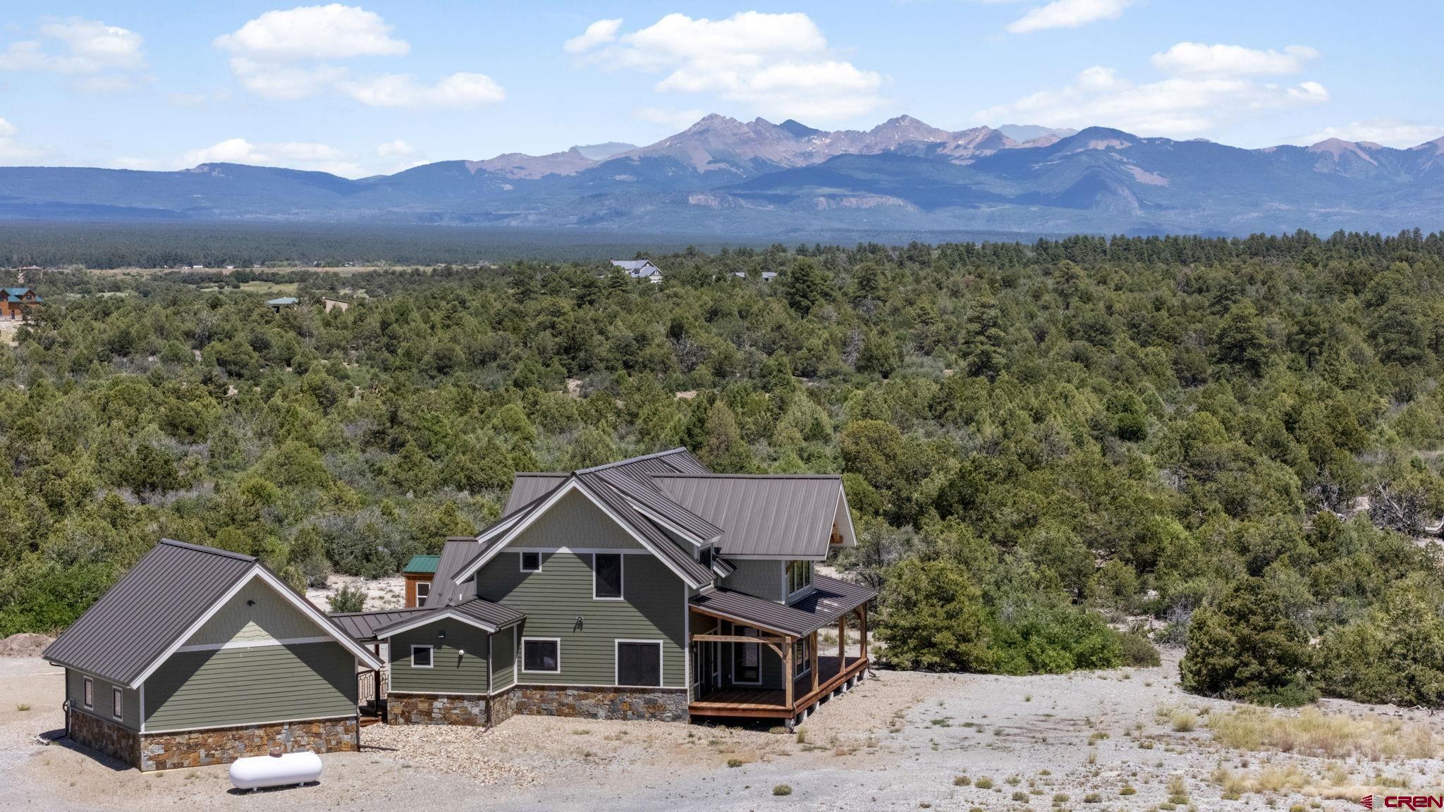 34958 Rd P.2 Mancos, CO 81328 - Photo 39 of 44 a view of a house with a yard