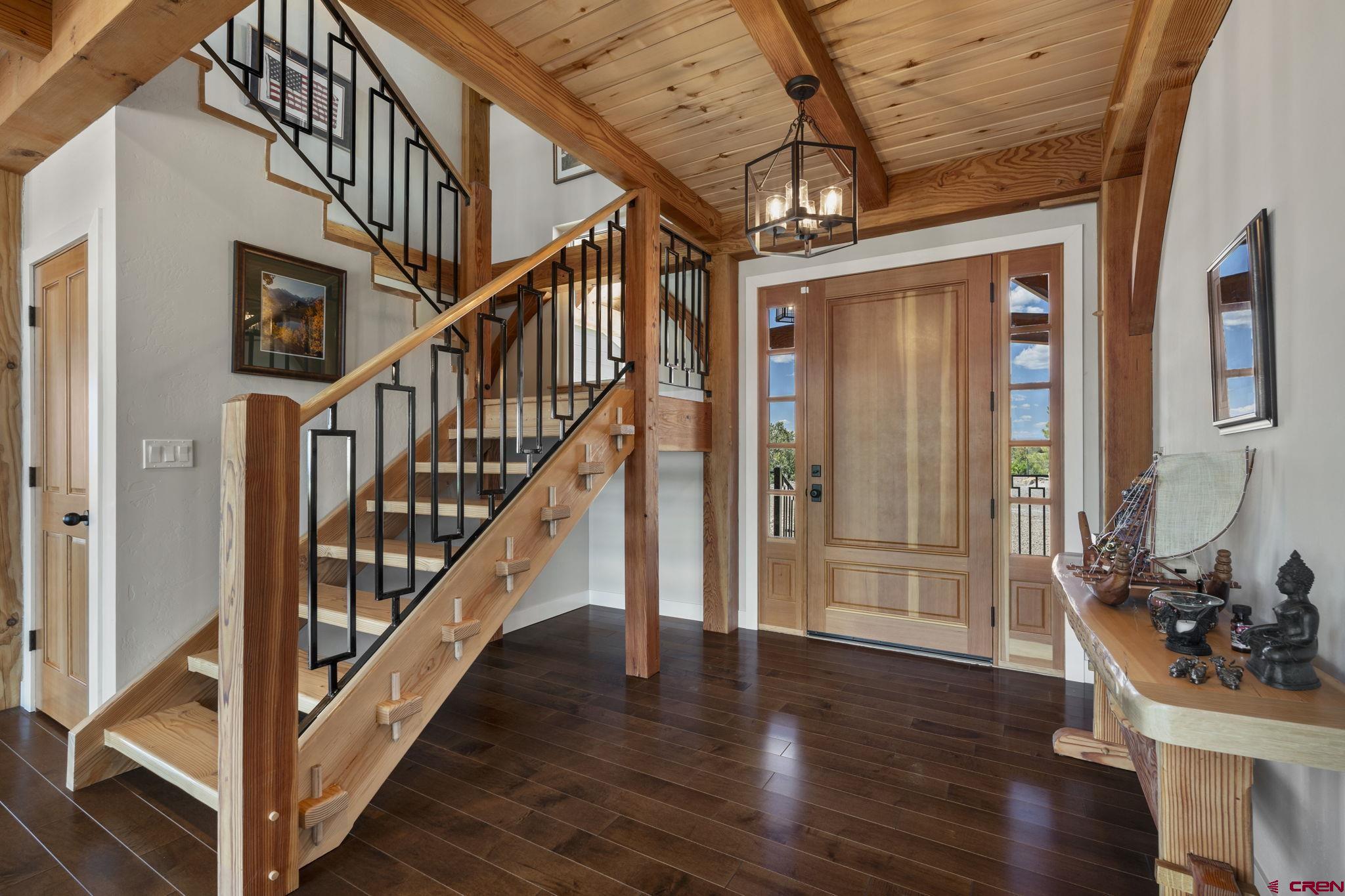 34958 Rd P.2 Mancos, CO 81328 - Photo 4 of 44 a view of an entryway with wooden floor and door