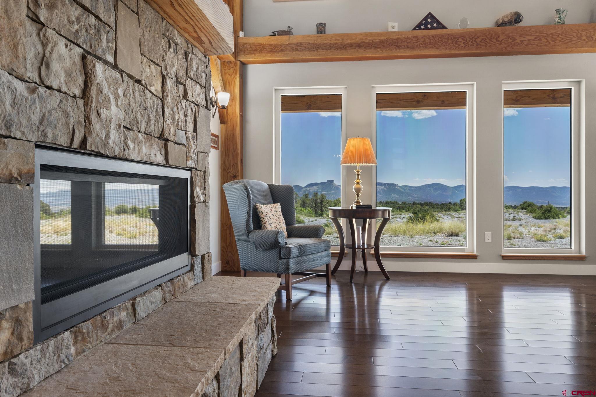 34958 Rd P.2 Mancos, CO 81328 - Photo 7 of 44 a view of a livingroom with furniture window and wooden floor