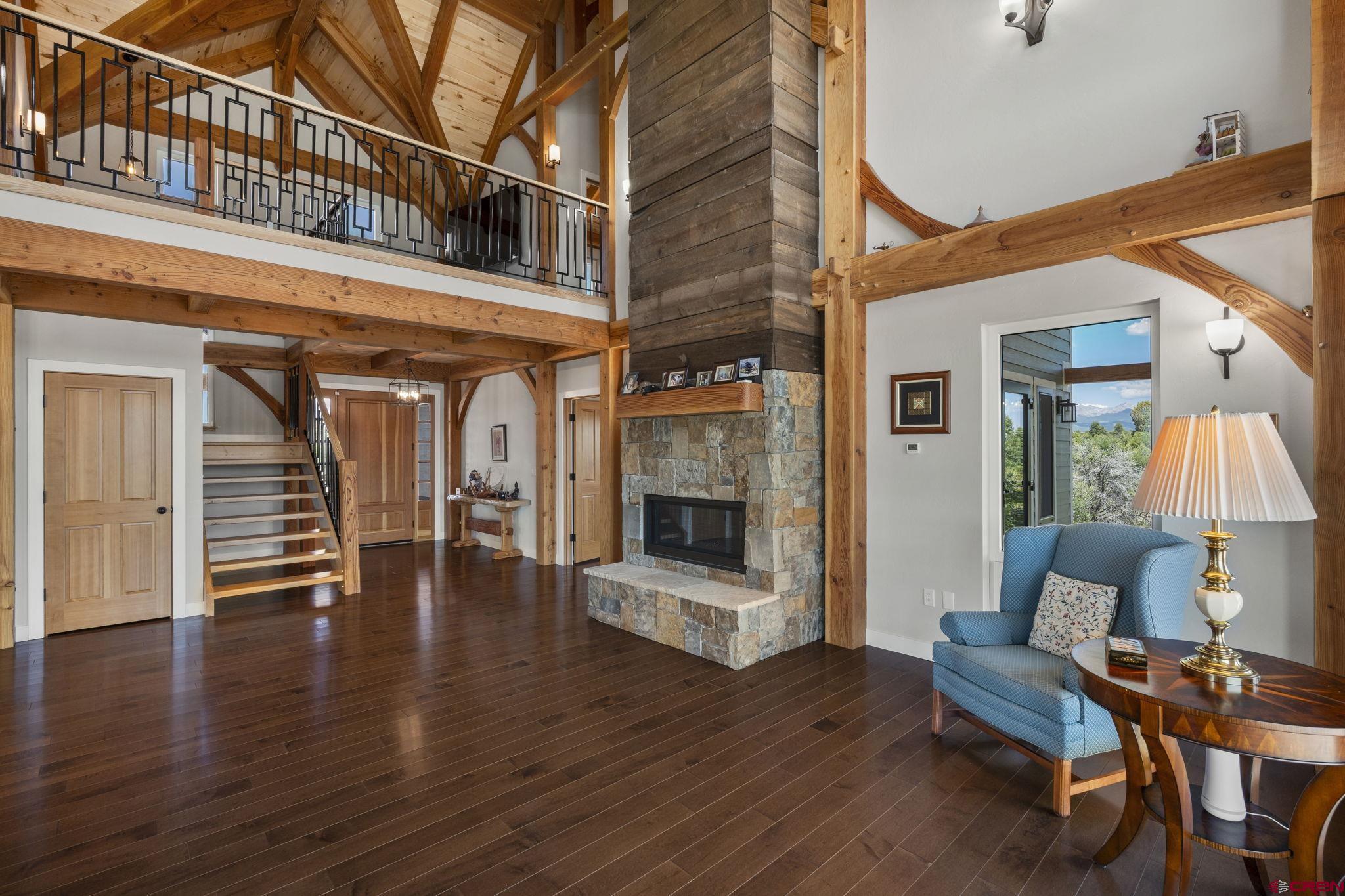 34958 Rd P.2 Mancos, CO 81328 - Photo 9 of 44 a view of a livingroom with furniture and a fireplace
