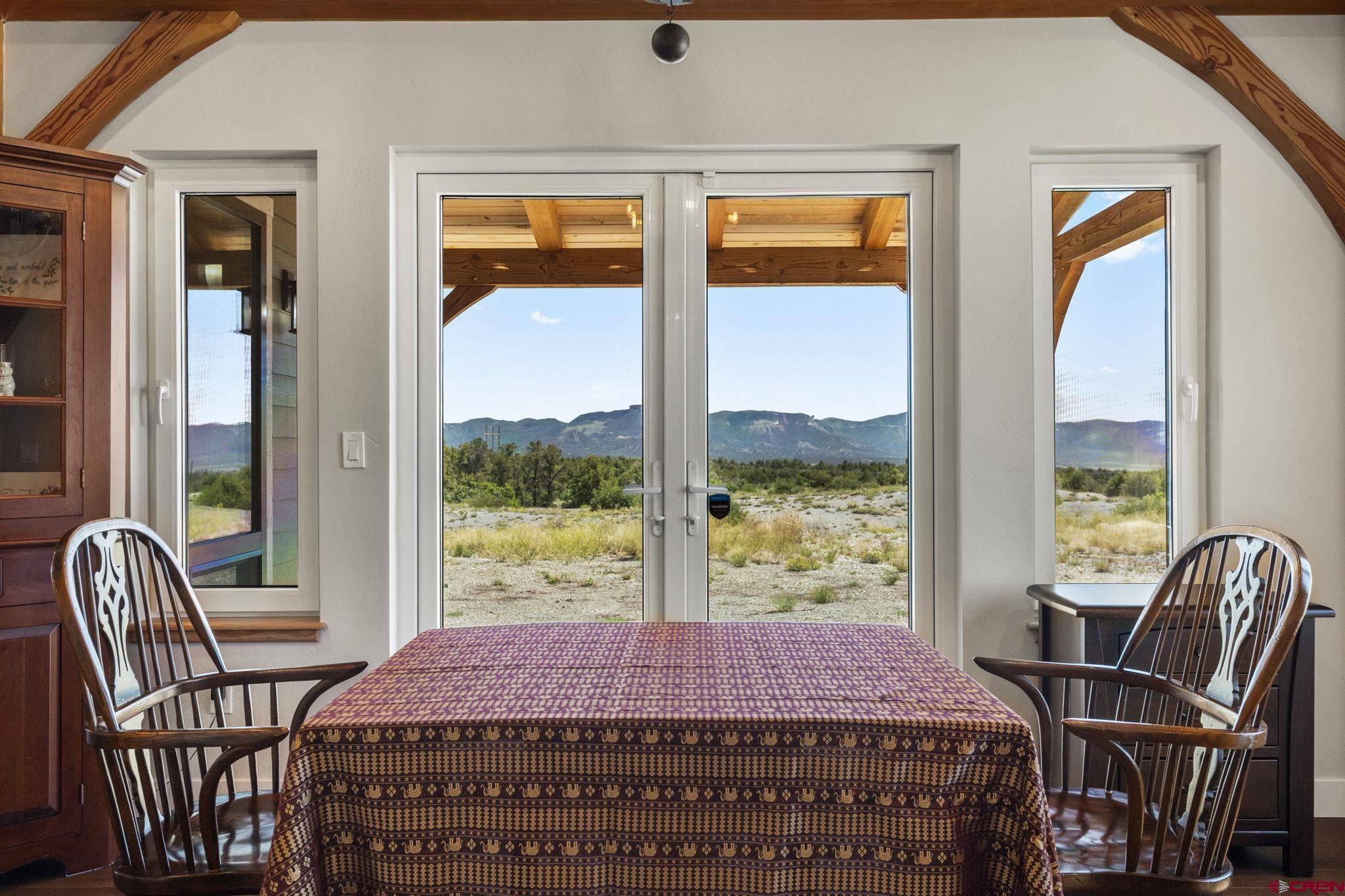 34958 Rd P.2 Mancos, CO 81328 - Photo 10 of 44 a bedroom with a bed and wooden floor