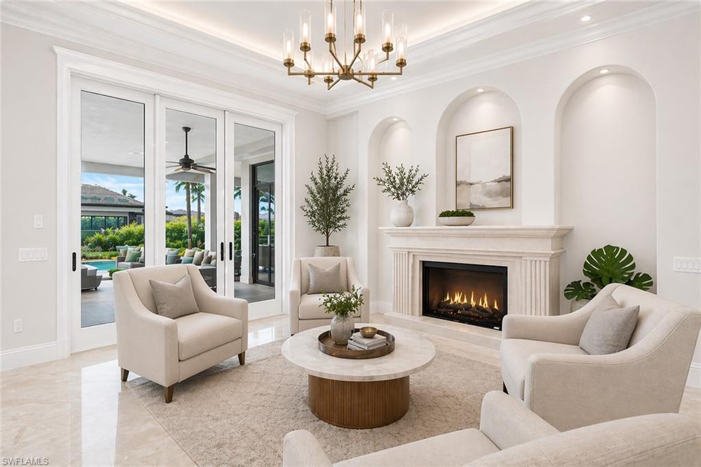 1330 Marlin Drive Naples, FL 34102 - Photo 13 of 44 AI reimagined sitting area with fireplace