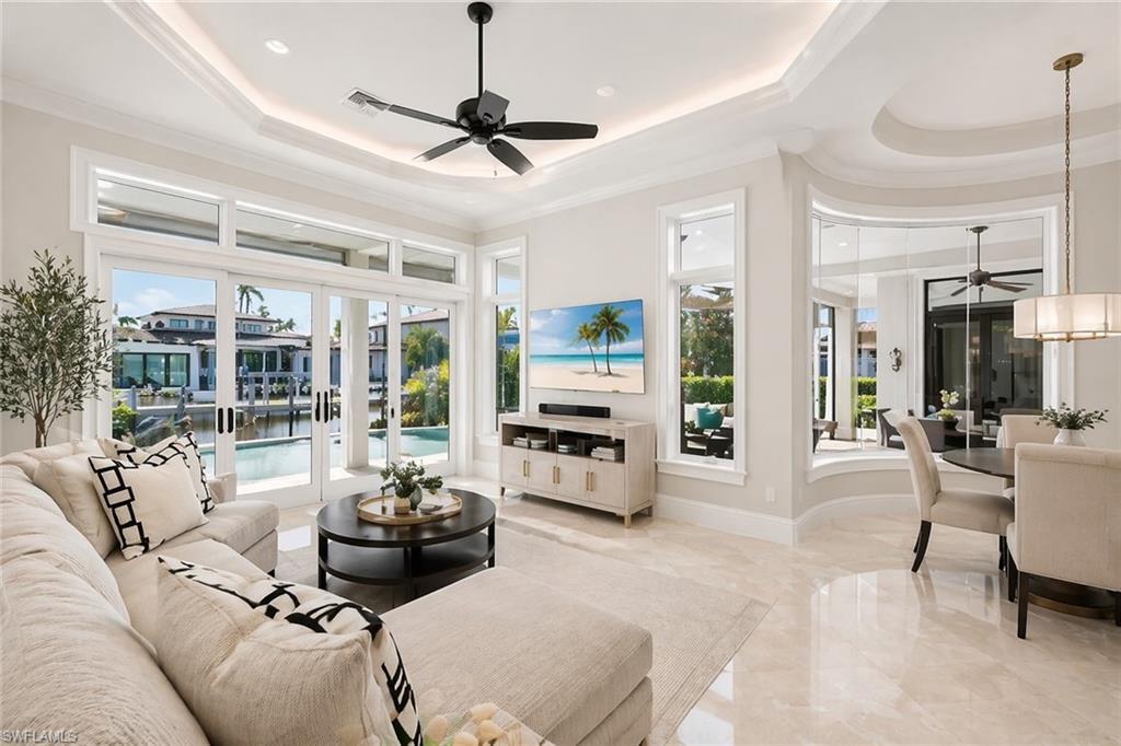 1330 Marlin Drive Naples, FL 34102 - Photo 10 of 44 AI reimagined family room w/patio access