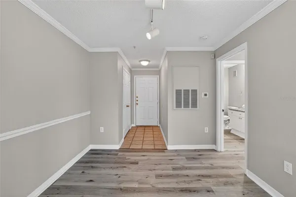 a view of entryway with wooden floor