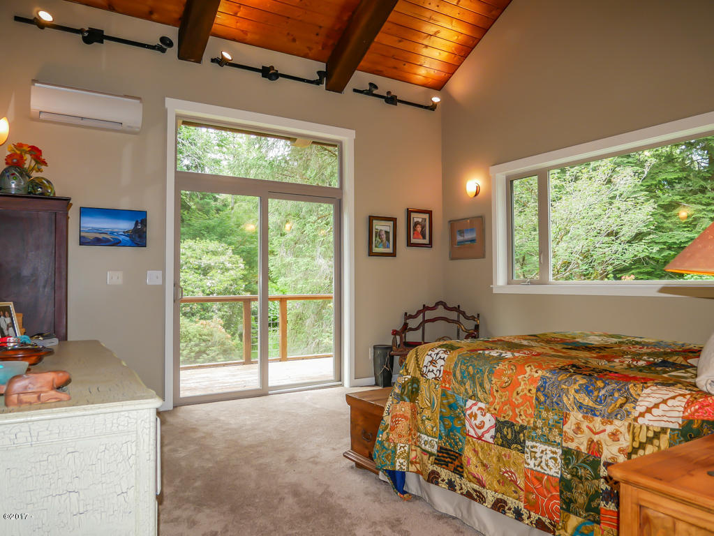 847 Hamer Road Siletz, OR 97380 - Photo 20 of 79 Master bedroom w/ deck