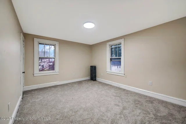 an empty room with an entryway