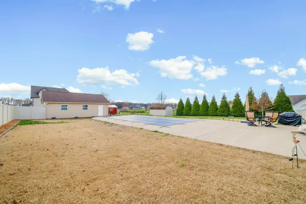 a view of a swimming pool with a lake view