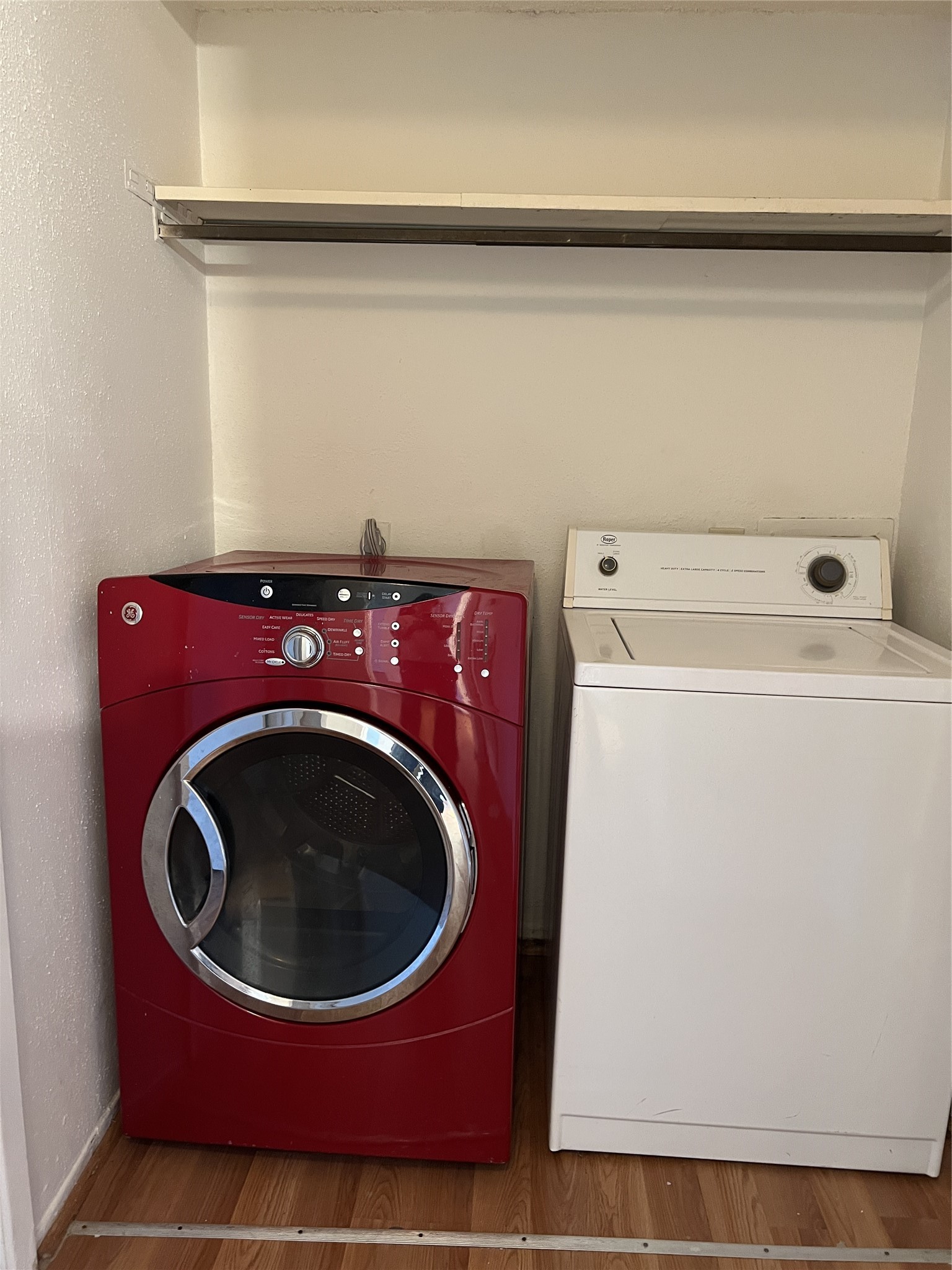 9522 Pagewood Lane, Unit 9522 Houston, TX 77063 - Photo 12 of 22 a utility room with dryer and washer