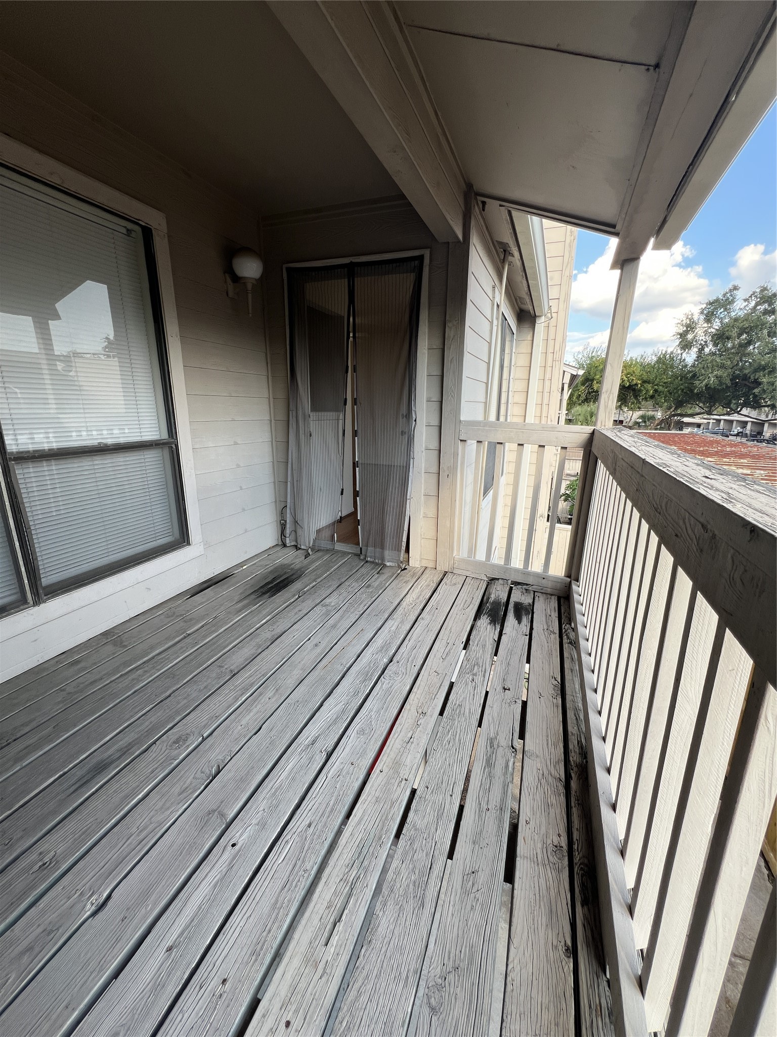 9522 Pagewood Lane, Unit 9522 Houston, TX 77063 - Photo 20 of 22 a view of outdoor space with wooden floor and stairs