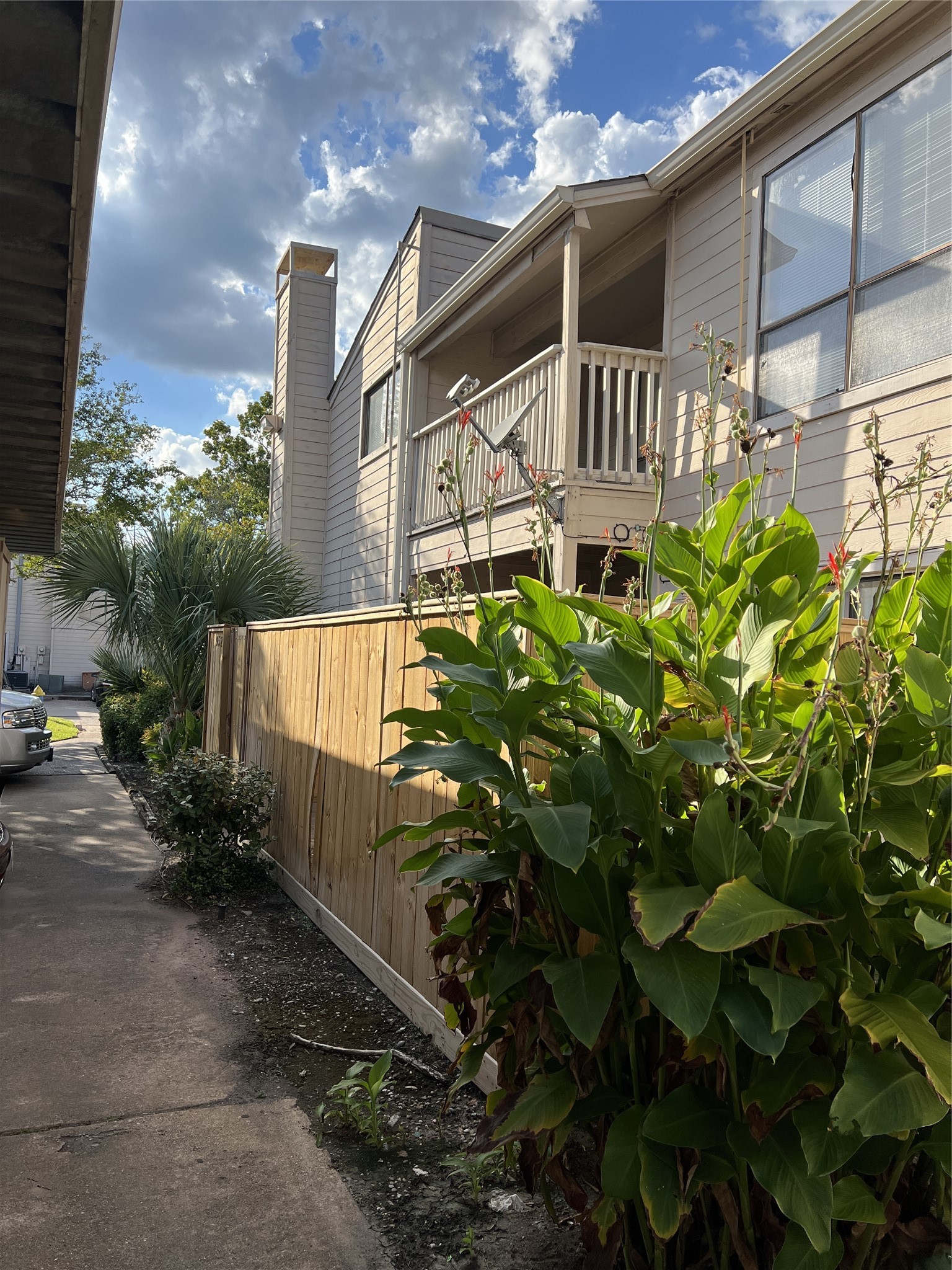 9522 Pagewood Lane, Unit 9522 Houston, TX 77063 - Photo 2 of 22 a view of a yard with plants