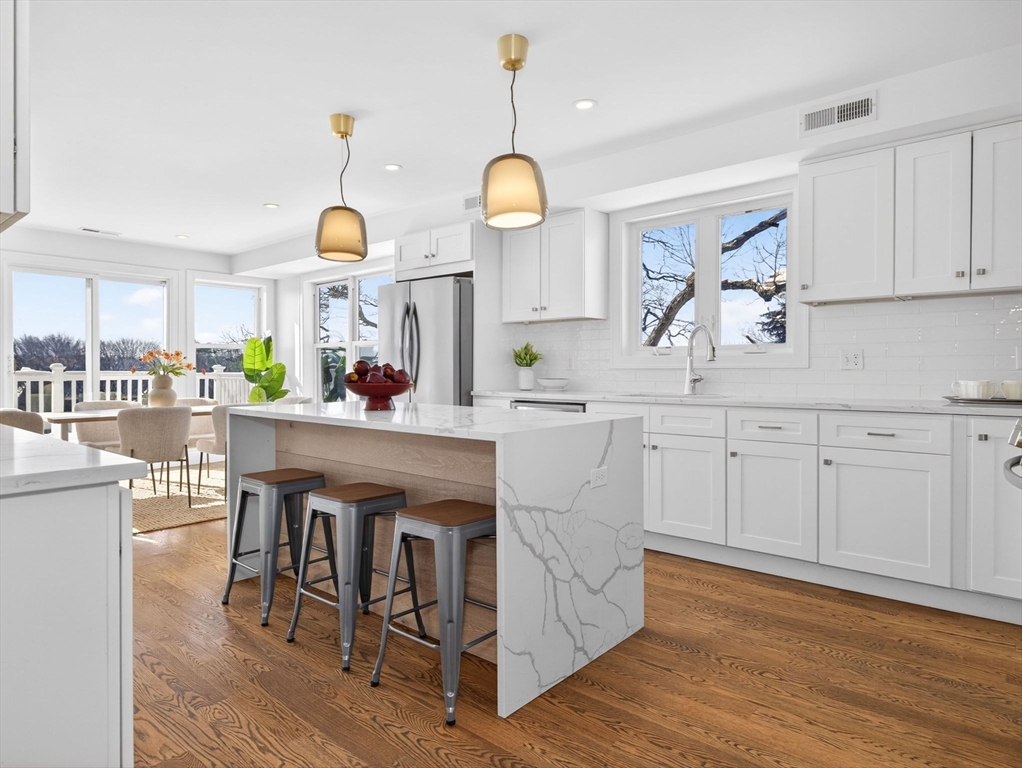 25 Cranston Street, Unit 2 Boston, MA 02130 - Photo 1 of 41 a kitchen with a sink cabinets and wooden floor