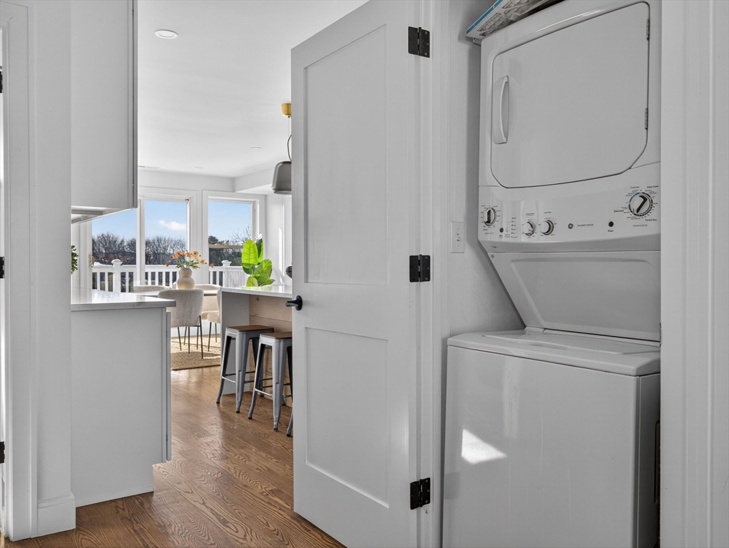 25 Cranston Street, Unit 2 Boston, MA 02130 - Photo 11 of 41 a view of kitchen with furniture and wooden floor