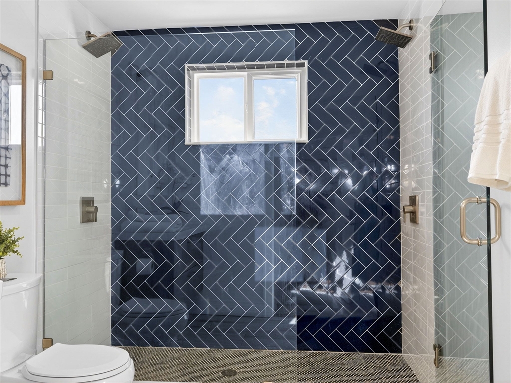 25 Cranston Street, Unit 2 Boston, MA 02130 - Photo 19 of 41 a bathroom with a toilet