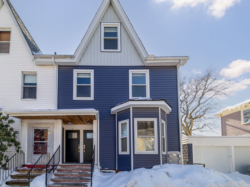 25 Cranston Street, Unit 2 Boston, MA 02130 - Photo 2 of 41 a front view of a house with glass windows