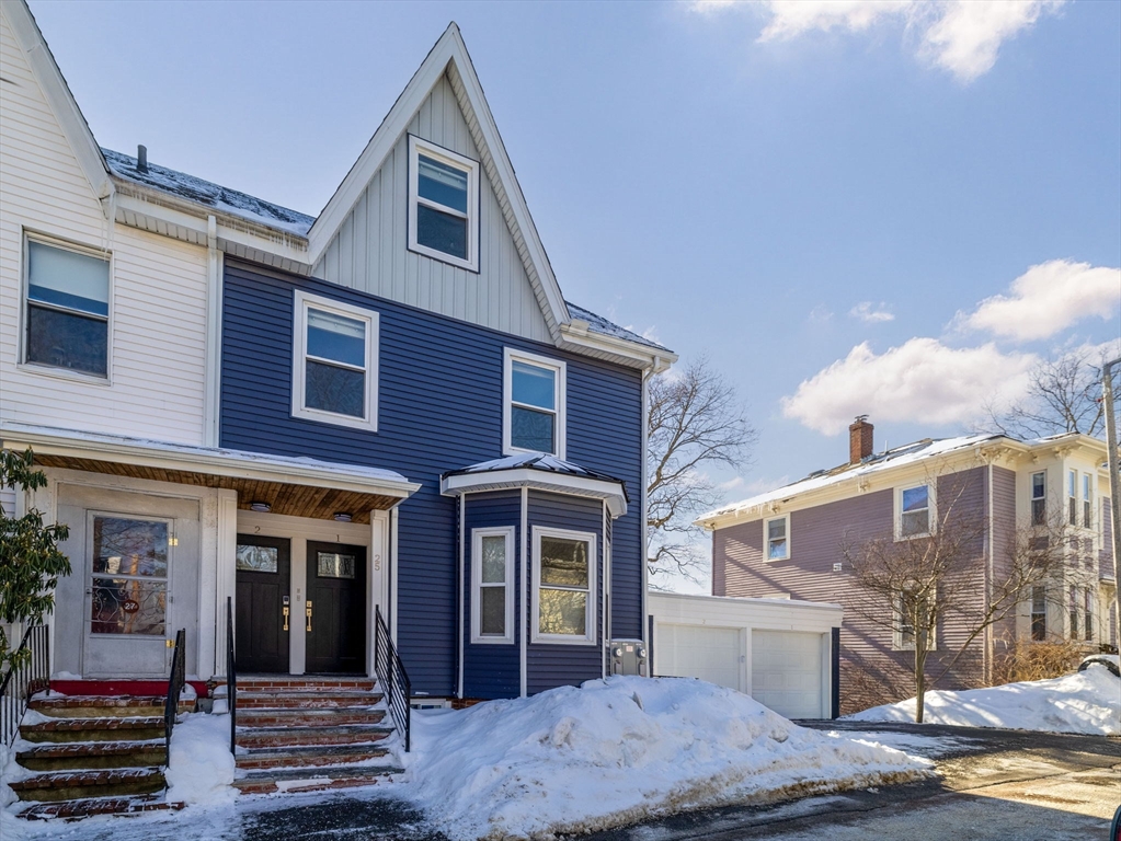 25 Cranston Street, Unit 2 Boston, MA 02130 - Photo 28 of 41 a front view of a house with a yard