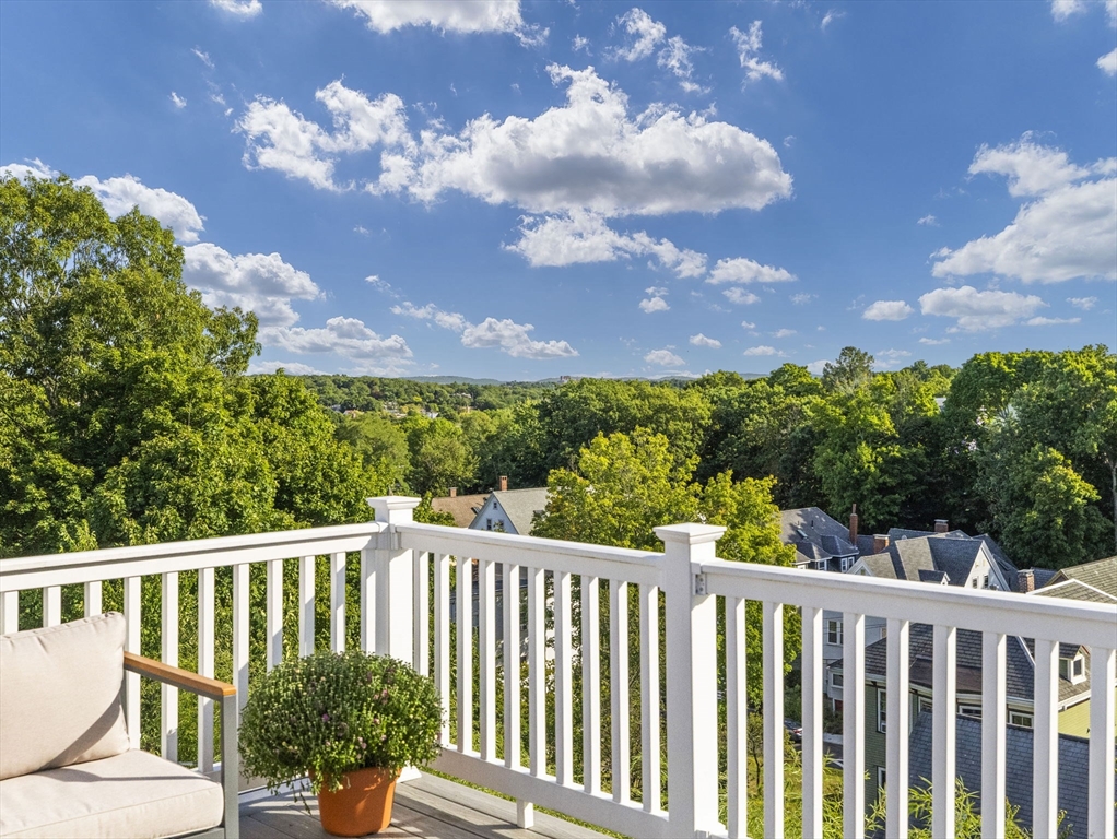 25 Cranston Street, Unit 2 Boston, MA 02130 - Photo 33 of 41 a view of a balcony with wooden floor and fence